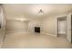 Finished basement with tile flooring and classic light fixture at 3756 S Forest Way, Denver, CO 80237