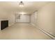 Finished basement with built-in storage and a dark fireplace at 3756 S Forest Way, Denver, CO 80237