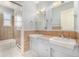 Bathroom featuring dual sinks and a tub/shower at 3756 S Forest Way, Denver, CO 80237