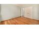 Bedroom with wood floors, light blue walls, and double closet at 3756 S Forest Way, Denver, CO 80237