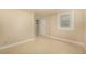 Bright bedroom features neutral paint, tile floor and large closet space at 3756 S Forest Way, Denver, CO 80237