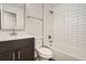 Updated bathroom with subway tile, modern vanity, and bathtub at 15934 E Columbia Pl, Aurora, CO 80013