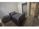 Comfortable bedroom with a modern bed, closet, and carpet floors at 14445 Hop Clover Trl, Parker, CO 80134