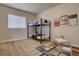 Cozy bedroom with a bunkbed, window and a table with chairs on a colorful rug at 14445 Hop Clover Trl, Parker, CO 80134