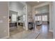 Inviting view of a home office and living room, featuring modern decor and open space at 14445 Hop Clover Trl, Parker, CO 80134