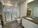 Modern bathroom with a large shower and updated vanity at 16602 E 109Th Ave, Commerce City, CO 80022