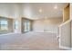 Finished basement featuring a stairway and sliding glass door at 841 W 128Th Pl, Westminster, CO 80234