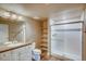 Modern bathroom with a shower and a floating vanity at 841 W 128Th Pl, Westminster, CO 80234