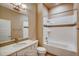 Modern bathroom with a bathtub, shower, and updated vanity at 841 W 128Th Pl, Westminster, CO 80234