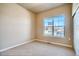 Bright bedroom with a large window and neutral decor at 841 W 128Th Pl, Westminster, CO 80234