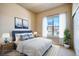 Comfortable bedroom with a queen-size bed and ample natural light at 841 W 128Th Pl, Westminster, CO 80234