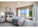 Bright bedroom with plush bed and large windows offering natural light at 841 W 128Th Pl, Westminster, CO 80234