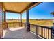 Covered deck offering scenic neighborhood views at 841 W 128Th Pl, Westminster, CO 80234