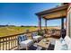 Spacious deck with mountain views and seating area at 841 W 128Th Pl, Westminster, CO 80234