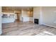 Bright living room with hardwood floors and open concept kitchen view at 841 W 128Th Pl, Westminster, CO 80234