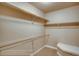 Large walk-in closet with double rods and bench at 841 W 128Th Pl, Westminster, CO 80234