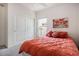 Comfortable bedroom featuring a spacious closet and relaxing decor at 21062 Hawthorne Ln, Parker, CO 80138
