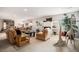 Spacious living room with fireplace and cozy seating at 21062 Hawthorne Ln, Parker, CO 80138