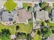 Well-maintained backyard featuring a manicured lawn, patio, and lush landscaping, creating an inviting outdoor space at 9810 Venneford Ranch Rd, Highlands Ranch, CO 80126