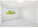 Bright bedroom with ample natural light and neutral carpet at 9810 Venneford Ranch Rd, Highlands Ranch, CO 80126