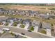 A scenic aerial shot showcasing the home's location within a growing community with green spaces at 2351 Monte Vista St, Fort Lupton, CO 80621