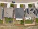 A bird's eye view displays the property's well-maintained lawn and neighborhood with community landscaping at 2351 Monte Vista St, Fort Lupton, CO 80621