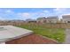 Image showing a spacious backyard with a new concrete patio and a classic wood fence at 2351 Monte Vista St, Fort Lupton, CO 80621