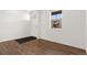 Welcoming entryway featuring hardwood floors, a window, and plenty of natural light at 2351 Monte Vista St, Fort Lupton, CO 80621