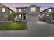 Charming two-story home features a landscaped front yard and inviting curb appeal at 2351 Monte Vista St, Fort Lupton, CO 80621