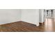 A bright and open living area featuring hardwood floors at 2351 Monte Vista St, Fort Lupton, CO 80621