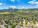 Aerial shot showcases the property's proximity to Chatfield High School, Meadows Golf Club, and Ridge Rec Center at 6506 S Robb Way, Littleton, CO 80127