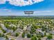 Aerial view showcasing the property's location near Powderhorn Park and Southwest Plaza Shopping Mall at 6506 S Robb Way, Littleton, CO 80127