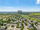 The home's aerial view shows a location in proximity to the Meadows Golf Club and the surrounding neighborhood at 6506 S Robb Way, Littleton, CO 80127