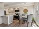 Modern kitchen features stainless steel appliances and bar seating at 655 N Pearl St # 301, Denver, CO 80203