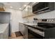 Modern kitchen features stainless steel appliances and white countertops at 655 N Pearl St # 301, Denver, CO 80203