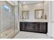 Lovely bathroom with a walk-in shower, and and sinks at 6930 Hyland Hills St, Castle Pines, CO 80108