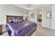 Comfortable bedroom with plush bedding and an ensuite bathroom at 6930 Hyland Hills St, Castle Pines, CO 80108