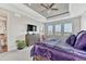 Spacious bedroom with a trey ceiling, plush carpet, and great natural light at 6930 Hyland Hills St, Castle Pines, CO 80108
