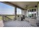 Relaxing outdoor deck with comfortable seating and views of the surrounding landscape at 6930 Hyland Hills St, Castle Pines, CO 80108