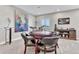 Entertainment room with a round game table, drum set, and stylish decor at 6930 Hyland Hills St, Castle Pines, CO 80108