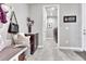 Inviting mudroom with bench seating, storage cabinet, and easy access to the laundry area at 6930 Hyland Hills St, Castle Pines, CO 80108