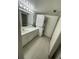 Bathroom with a sink, a washing machine, and a dryer, all in bright white color at 9995 E Harvard Ave # 177, Denver, CO 80231