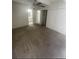 Bright bedroom featuring carpet floors and access to bathroom at 9995 E Harvard Ave # 177, Denver, CO 80231