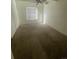 Cozy carpeted bedroom featuring a ceiling fan and a window providing natural light at 9995 E Harvard Ave # 177, Denver, CO 80231