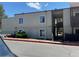 Apartment building exterior with stairs and walkway. Great natural lighting at 9995 E Harvard Ave # 177, Denver, CO 80231