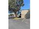 Exterior view of building M with ample parking and beautiful landscaping at 9995 E Harvard Ave # 177, Denver, CO 80231
