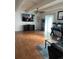 Bright living room featuring ceiling fan, wood floors, and a neutral color palette at 9995 E Harvard Ave # 177, Denver, CO 80231