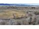 Scenic aerial view of land with trees and a road nearby at 7476 Park Lane Rd, Longmont, CO 80503