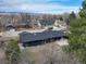 Aerial view of the property showcasing the home's roof, landscaping, and surrounding neighborhood at 7476 Park Lane Rd, Longmont, CO 80503