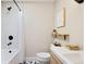 Modern bathroom featuring geometric tiled floor and shower with sleek black fixtures at 7476 Park Lane Rd, Longmont, CO 80503